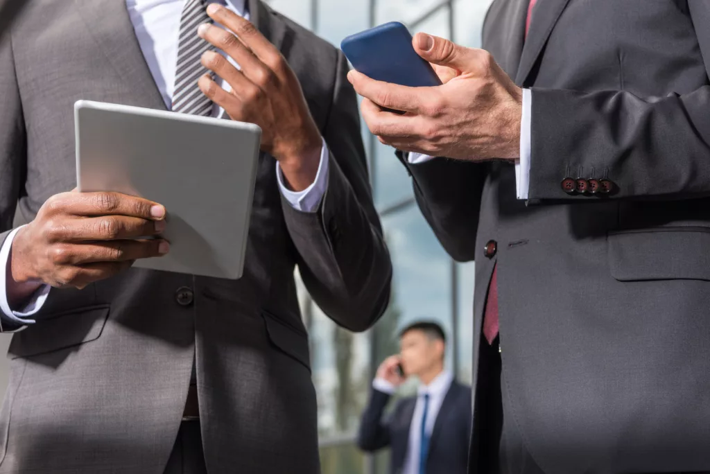 men in a suit reviewing Business Insurance and Professional Liability Insurance in Frisco, Texas